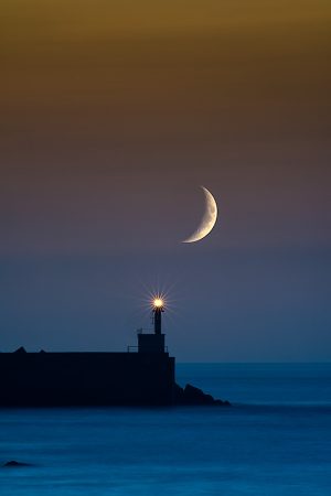 Fotografía de crepúsculos luna faro San Esteban